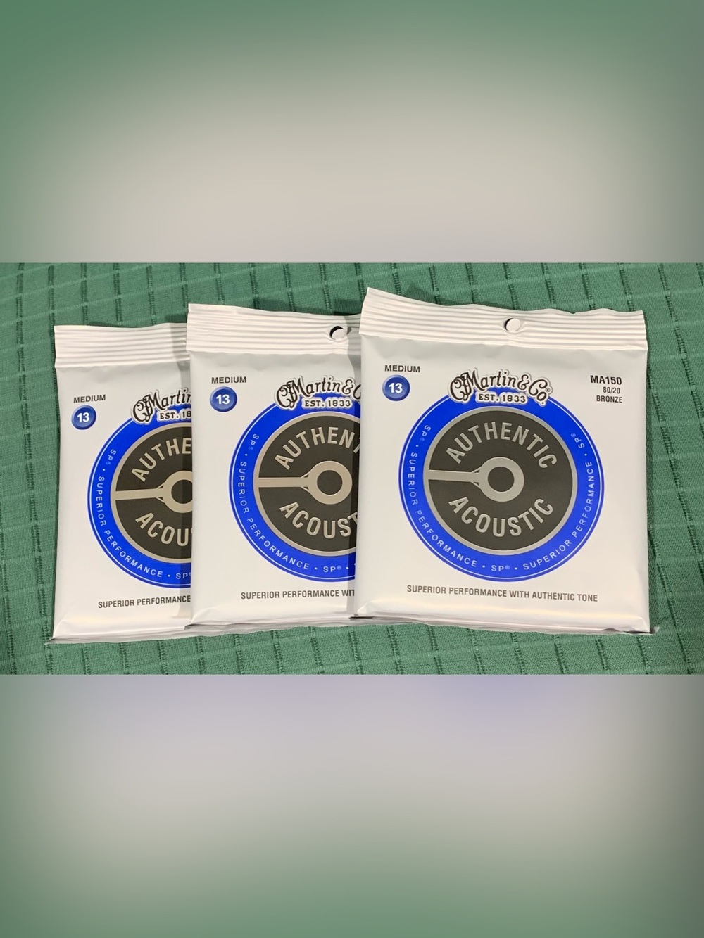 New 3 Martin MA150 Acoustic 80/20 Bronze Medium (.013 - .056) guitar strings.